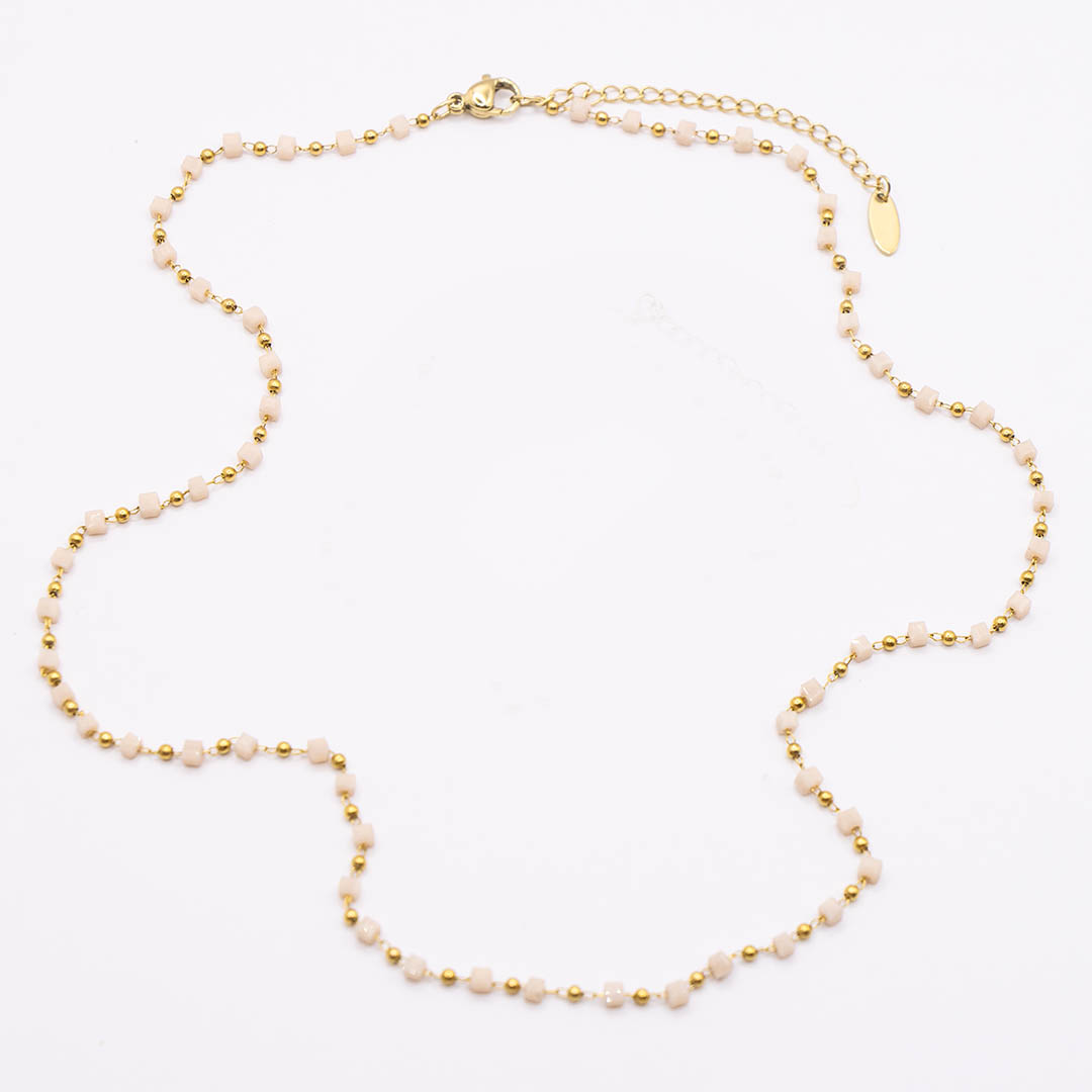 Naszyjnik z beżowymi koralikami pozłacany ze stali
