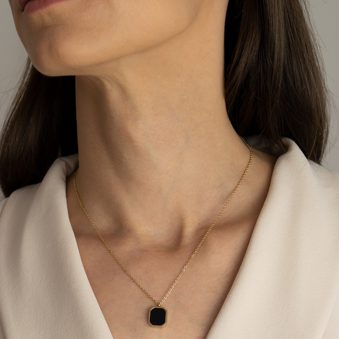 Naszyjnik pozłacany z czarnym oczkiem na łańcuszku ankier stal szlachetna