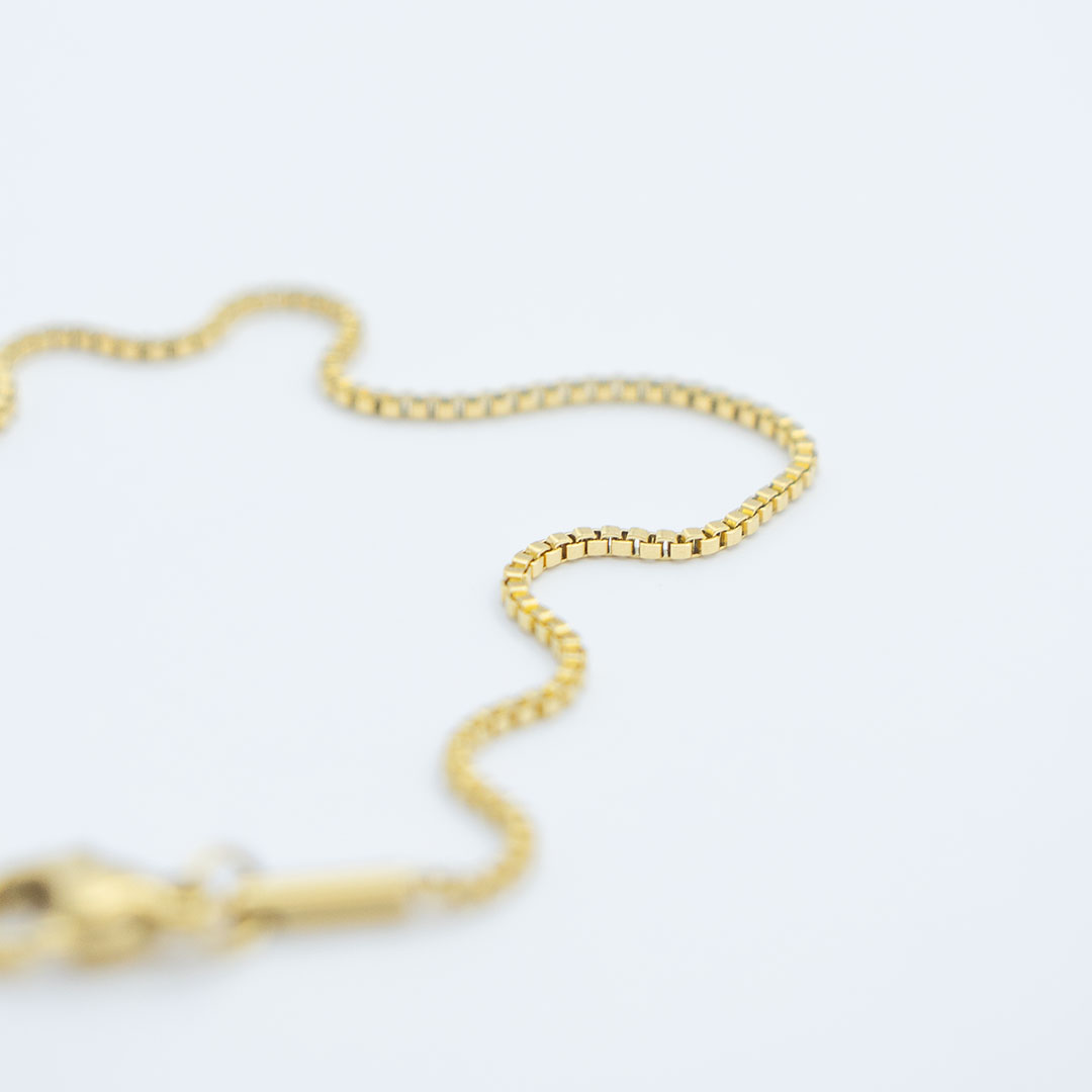 Bransoletka splot kostka pozłacana stalowa