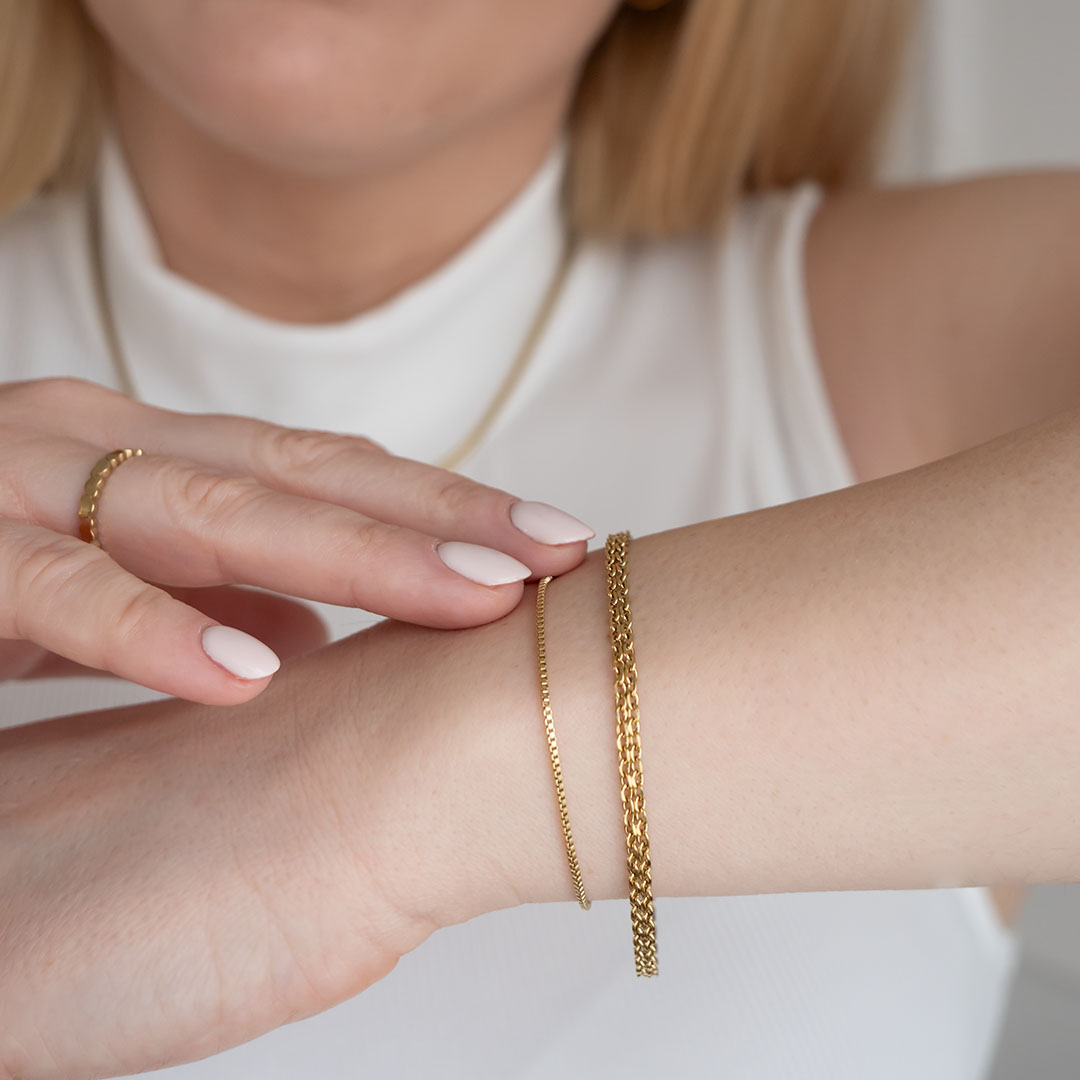 Bransoletka splot kostka pozłacana stalowa