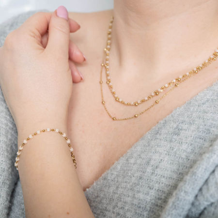 Bransoletka z beżowymi koralikami